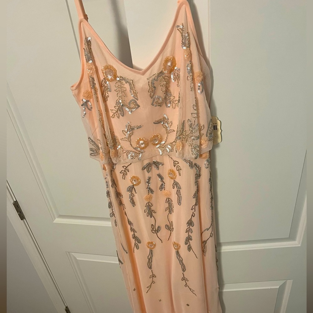 Floor length, beaded gown with adjustable straps, very pale peachy color, NWT